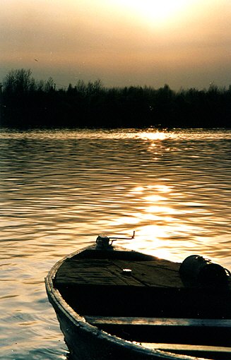 Volhovsky district. Issad. View with a boat.